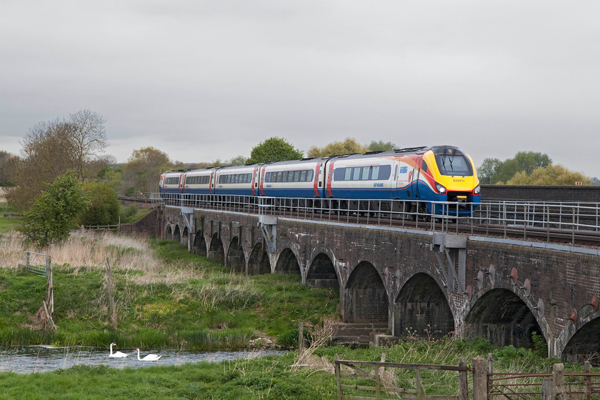 222011, EM 09.49 Nottingham-London St. Pancras (1C32, 2L), Radwell Viaduct TL008569 
 Of the two swans making their way up the River Great Ouse, one appears interested in 222011 whereas the other in somewhat nonplussed! The Meridian is crossing Radwell Viaduct working the 09.49 Nottingham to London St. Pancras 1C32 service. 
 Keywords: 222011 1C32 Radwell Viaduct TL008569