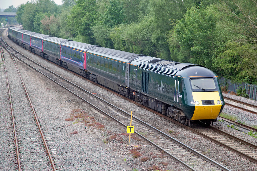 43042 & 43125, GW 10.25 Evesham-London Paddington (1P40, 87L), Godstow Bridge 
 A mixed combo HST drifts into Oxford past Godstow Bridge. Led by 43042 with 43125 on the rear, the 10.25 Evesham to Paddington service was already very late here, finally arriving at its destination almost and hour and a half adrift. Little did I know that the next time that I would see the rear power car, 43125, two weeks later, it would have been de-branded and taking a set of stock for storage through the county of Rutland! 
 Keywords: 43042 43125 1P40 Godstow Bridge