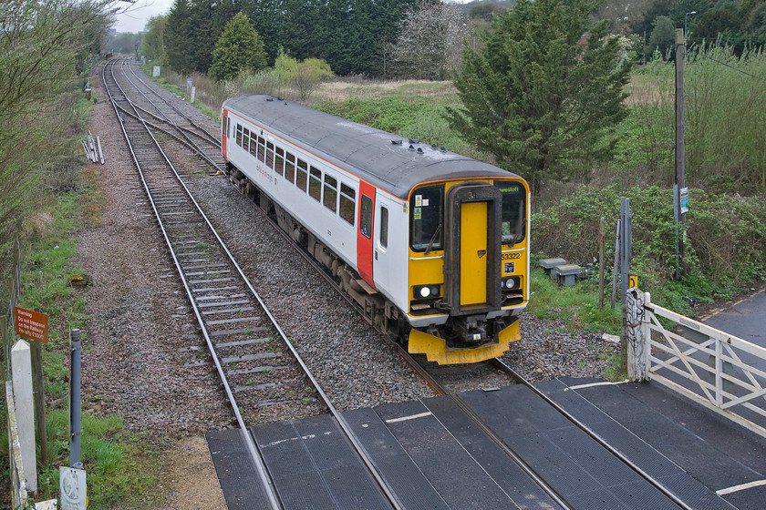 153332, LE 12.05 Norwich-Lowestoft (2J74), Whitlingham Lane crossing TG266083 
 153332 gathers speed as it approaches Whitlingham Junction working the 12.05 Norwich to Lowestoft service. Notice the crossover level with the rear of the train allowing a greater degree of flexibility just west of where the Sheringham line branches away to the north behind where I am standing. 
 Keywords: 153332 12.05 Norwich-Lowestoft 2J74 Whitlingham Lane crossing TG266083 Abellio Greater Anglia