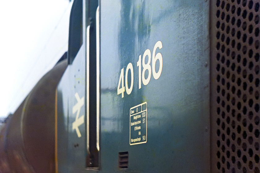 40186, up tanker train, Crewe station 
 The number and data panel of 40186 standing at Crewe station. 40186 was delivered new to York in 1962 and gave just over 20 years of service until it was cut up at BREL Doncaster. 
 Keywords: 40186 Crewe