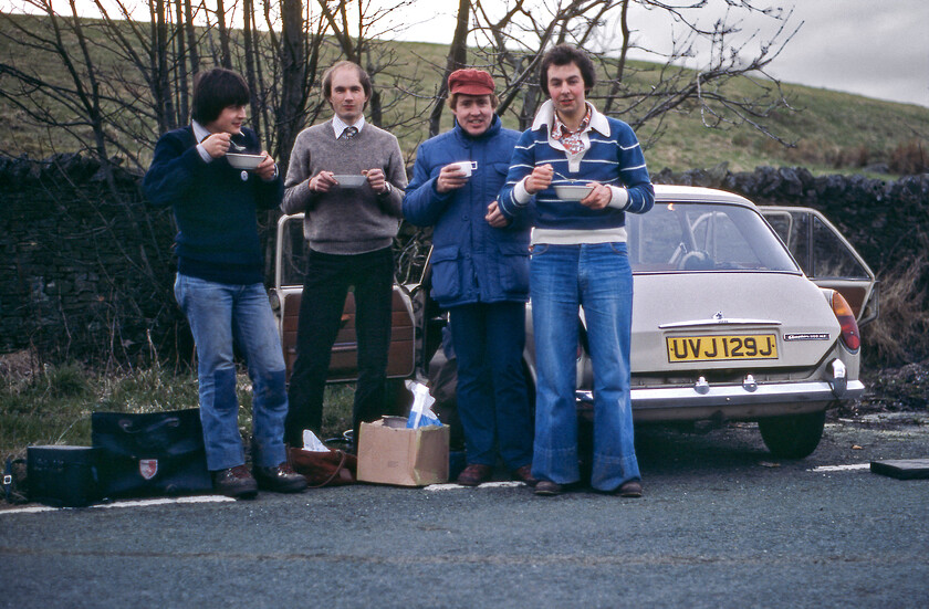 Me, Graham, Paul & David, Low Paley Green SD791639 
 With the day's gricing activities over it was time for a well-earned rest and re-fuel before embarking on the long journey home. From left to right, yours truly, Graham, Paul and David pose for the camera next to UVJ 129J near the hamlet of Low Paley Green. I am not at all sure what we eating from the bowls as it was tea time rather than breakfast but when on tour anything usually went! Incidentally, a quick look at Google Earth (and Streetview) reveals that the small layby that we are parked in still exists if a little narrower now making end-on parking difficult to achieve! 
 Keywords: Me Graham Paul David Low Paley Green SD791639