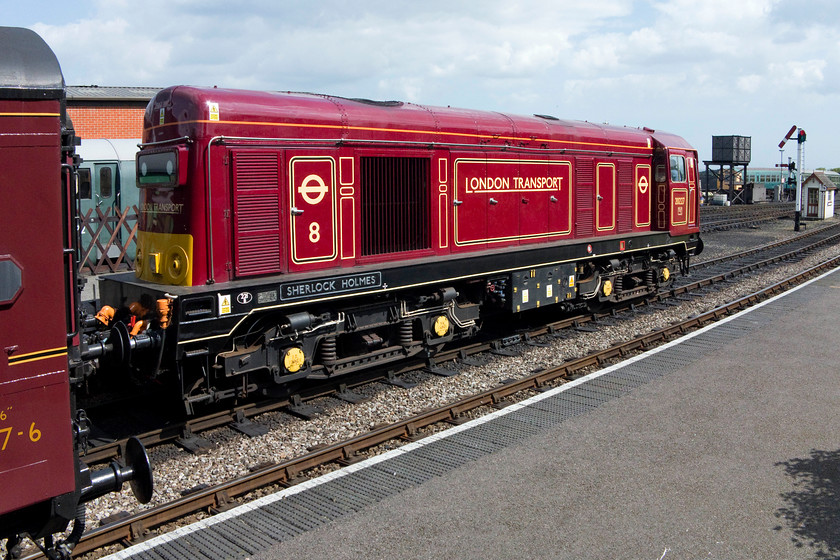 20227, 10.35 Holt-Sheringham, Weybourne station 
 20227 'Sherlock Holmes' was only named a few weeks prior to its arrival at the North Norfolk Railway for thier summer season. The starter summersault has given the train the road and it is about to leave Weybourne station with the 10.35 Holt to Sheringham working. 
 Keywords: 20227 10.35 Holt-Sheringham Weybourne station