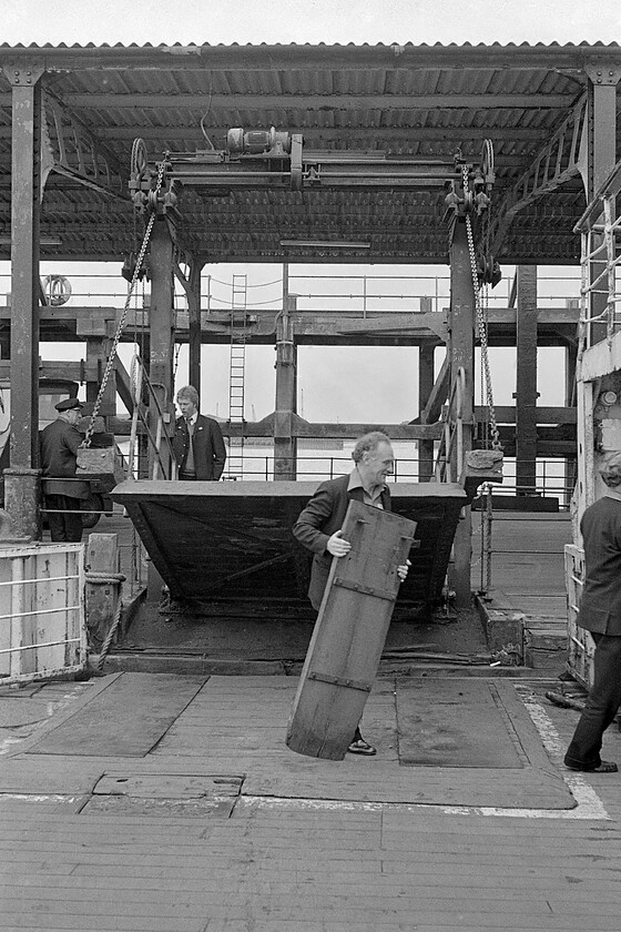 MV Farringford, raising the gangplank, 16.50 New Holland Pier-Hull Corporation Pier, New Holland Pier 
 With all the cars and passengers safely loaded on board the gangplank is raised and MV Farringford can set sail with the 16.50 service from New Holland Pier to Hull Corporation Pier. I suspect that health and safety today would prevent this sort of loading arrangements on a ferry and definitely no passengers on the car deck taking photographs of operations! 
 Keywords: MV Farringford raising the gangplank 16.50 New Holland Pier-Hull Corporation Pier New Holland Pier Sealink