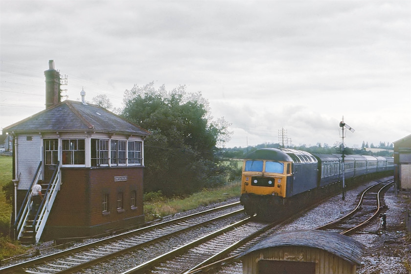 47485, 08.34 Penzance-London Paddington, Somerton 
 47485 rattles past the lovely signal box at Somerton heading the 08.34 Penzance to London Paddington. 47485 led a pretty uneventful life only carrying this number and the pre-tops one, D1683. It was an early withdrawal in October 1993 being cut up at Crewe. 
 Keywords: 47485 08.34 Penzance-London Paddington Somerton