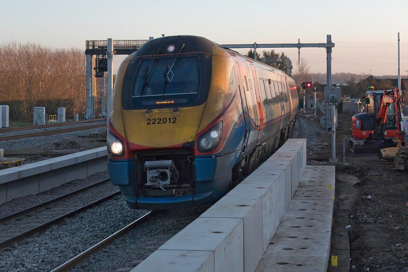 222012, EM 14.31 London St. Pancras-Sheffield (1F52, 16L), Wellingborough station 
 222012 passes through Wellinbrorogh station forming the 14.31 St. Pancras to Sheffield service. At the southern end of the East Midlands station, the platforms are being extended in order to accommodate new and longer trains that will be introduced sometime after the electrification is completed. 
 Keywords: 222012 14.31 London St. Pancras-Sheffield 1F52 Wellingborough station meridian midland mainline MML