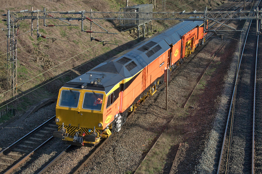 DR75009, 13.00 Paddock Wood Keylands sidings-Rugby DED, Victoria bridge 
 Despite the strange times that we are in, some normality prevails! Colas owned and operated DR75009 passes Victoria bridge just south of Roade as the 13.00 Paddock Wood Keylands Sidings to Rugby. This Plasser and Theurer Unimat 09-4x4/4S Dynamic Tamper still looks very smart not yet being a year old. 
 Keywords: DR75009 13.00 Paddock Wood Keylands sidings-Rugby DED Victoria bridge