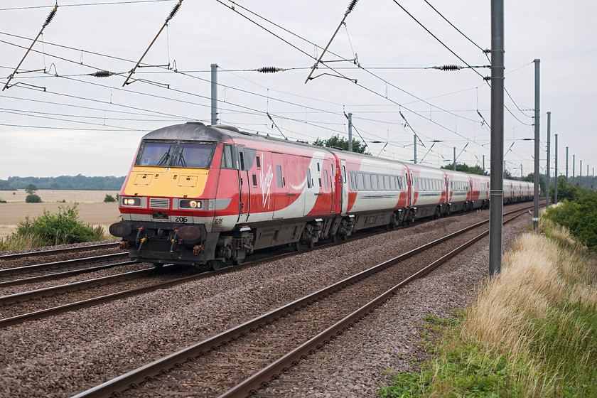 82206, GR 06.30 Newcastle-London Kings Cross (1Y11, 3L), Sandy TL176510 
 DVT's are seldom photographed but they are a part of our railway as much as a locomotive is. They will soon go the way of all the older stock that is being superseded so I photograph them as much as everything else! 82206 leads the 06.30 Newcastle to King's Cross past New Zealand bridge just north of Sandy. 
 Keywords: 82206 1Y11 Sandy TL176510