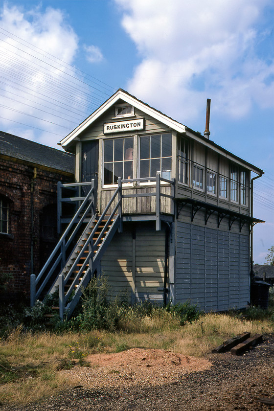 Ruskington signal box (GE, date not known) 
 Ruskington signal box was located at the southern end of the station and is seen here in front of the former goods shed. It is a superb example of a GER signal box but I do not have its year of construction. The station was closed by British Railways on 11.09.61 and after a long and protracted campaign it was reopened again by BR on 05.05.75. The box is now no more but one of the wooden nameboards sold at auction in November 2016 for what I think was a resonable price at 240. 
 Keywords: Ruskington signal box Great Eastern Railway GER