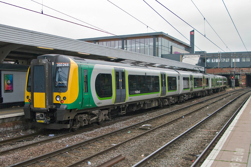 350248, LM waiting for 07.14 Birmingham New Street-London Euston (1Y10), Northampton station 
 350248 has recently arrived at Northampton after an early morning up commuter service. It now waits in platform one for the arrival of the 07.14 from Birmingham. The two set will then join and work forward to Euston. 
 Keywords: 350248 07.14 Birmingham New Street-London Euston 1Y10 Northampton station London Midland Desiro