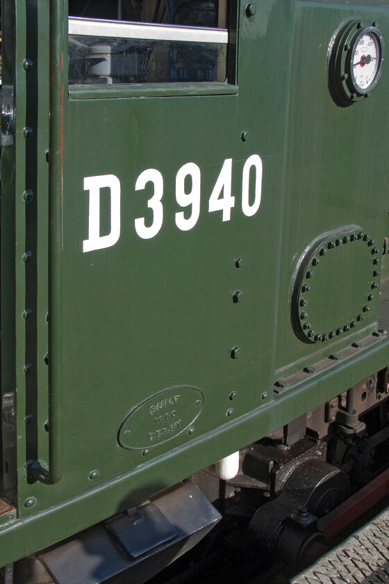 D3940, cab side details, Sheringham station 
 Very often unnoticed and unloved, the shunters are the real workhorses of most heritage lines. They move stock and locomotives around to enable the headline train services to operate and thus to keep the money rolling in! Built at Derby in 1960 D3940 (later to become 08772 under TOPS) was one of nine hundred and ninety sis Class 08s built up until 1962 making it by far the most numerous class constructed. It is seen at Sheringham station having just brought some dining train stock into the station. 
 Keywords: D3940 cab side details Sheringham station Class 08 shunter Gronk