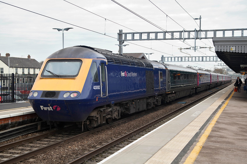 43092, GW 09.15 London Paddington-Cardiff C (1B17, 2E), Didcot Parkway station 
 43092 at the rear of the 09.15 London Paddington to Cardiff Central (1B17) working at its Didcot Parkway stop. 43092 started off life as an ER power car as part of set 254019. It then moved to the Midland Region and then to the Western Region where it has been since. 
 Keywords: 43092 1B17 Didcot Parkway station