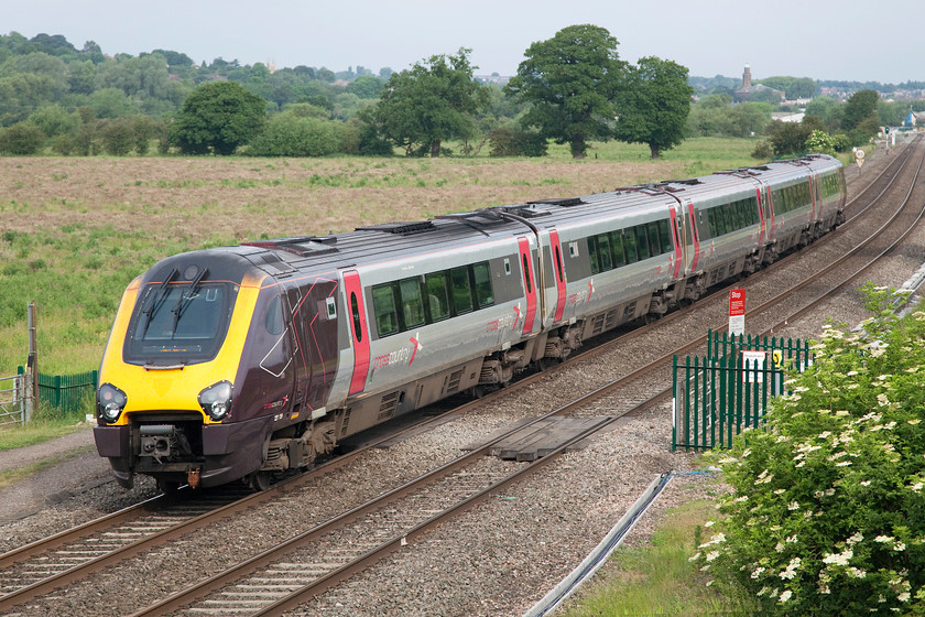 221139, XC 06.25 Bournmouth-Newcastle (1E82), Warkworth SP476394 
 The 1E82 06.25 Bournemouth to Newcastle approaches Banbury near the village of Warkworth worked by 221139. On the skyline is the Grade 1 listed St. Mary's church in Banbury with its conspicuous tower complete with a well weathered verdigris cap. 
 Keywords: 221139 06.25 Bournmouth-Newcastle 1E82 Warkworth SP476394