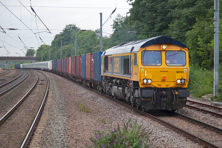 66751 & 700117, 03.14 Dollands Moor-Hornsey EMUD (Via Peterborough) (6X70), St 
 66751 'Inspiration Delivered Hitachi Rail Europe' leads some freight boxes and then one of the new class 700s on a gauging train through St. Neots station. The working is an out and back from Dollands Moor to Hornsey via a reversal at Peterborough. 
 Keywords: 66751 700117 03.14 Dollands Moor-Hornsey EMUD 6X70 St. Neots station Inspiration Delivered Hitachi Rail Europe