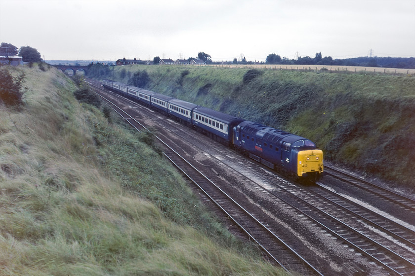 55006, 05.50 London King's Cross-Aberdeen (1S12), Essendine TF043129 
 With just five months left in service 55006 'The Fife and Forfar Yeomanry' leads the 1S12 05.50 King's Cross to Aberdeen. In rather dull weather after a nighttime gale had nearly pulled our tent out of the ground, the train is seen passing Essendine between Peterborough and Grantham. In less than a year, this fine locomotive would be reduced to a pile of scrap at Doncaster works.

There is an audio recording of this event on my youtube channel, see.... https://youtu.be/l34GrAuurDE 
 Keywords: 55006 05.50 London King's Cross-Aberdeen 1S12 Essendine TF043129 The Fife and Forfar Yeomanry