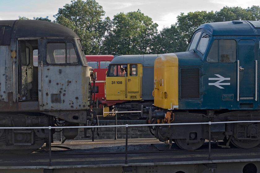 56128, 31108 & 45133, Wansford Yard 
 A trio of British Rail's finest stand stabled in Wansford Yard. To the left is a very tatty 56128 facing a very uncertain future with no real plans for it at present. Centre stage is 31108 and to the right is ETH fitted 45138. Behind the Class 31 is the unmistakable sight of a former London Transport Routemaster bus. 
 Keywords: 56128 31108 45133 Wansford Yard BR British Railways