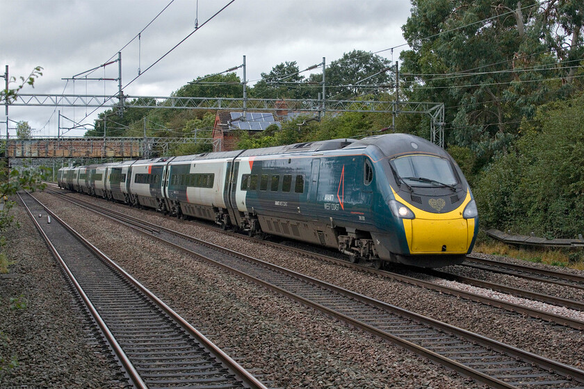 390001, 12.35 Manchester Piccadilly-London Euston (1A39, 3L), Cathiron SP4667783 
 The classic and ever-popular location just to the north-west of Rugby known locally as Cathiron has become Andy and my 'go-to' location on our return from some recent trips; today was no exception. 390001 'Bee Together' heads south on the up fast line working AWC's 12.35 Manchester Piccadilly to Euston 1A39 service. 
 Keywords: 390001 12.35 Manchester Piccadilly-London Euston 1A39 Cathiron SP4667783Bee Together Avanti West Coast AWC Pendolino