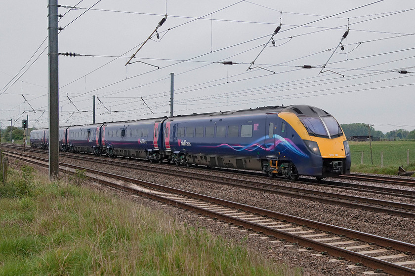 180110, HT 17.48 London Kings Cross-Beverley (1H06, 13L), Langford TL191396 
 Hull Trains' 180110 heads north past Langford south of Biggleswade forming the 17.48 London KIng's Cross to Beverley. This train works into Hull and then reverses back out and over West Parade Junction to head north the short distance to Beverley. 
 Keywords: 180110 1H06 Langford TL191396