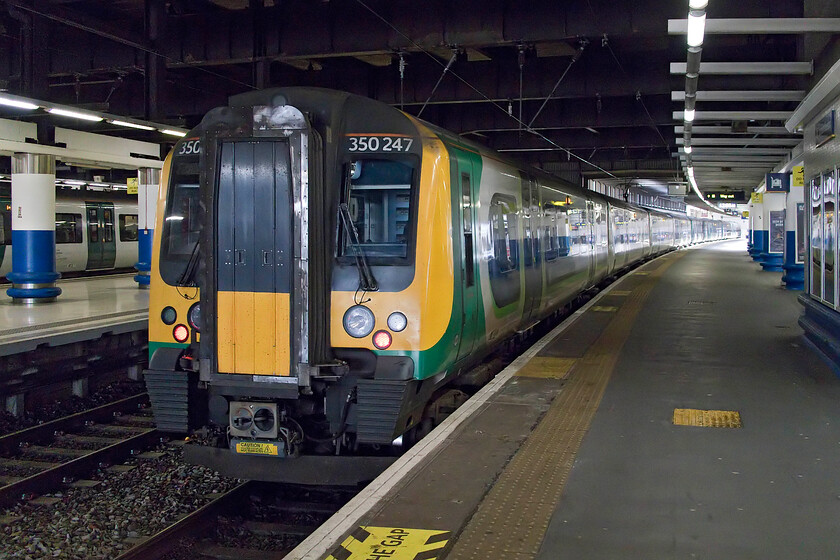 350247, LN 13.15 London Euston-Northampton (1Y17, 4L), London Euston station 
 Our train home to Northampton waits at Euston. My wife and I were for a short while the only passengers aboard the train as by using RTT rather than using the huge departure board on the concourse we were able to beat the mele that ensues once the platform is displayed. We took 350247 as the 1Y17 all the way working the 13.15 departure from the capital. 
 Keywords: 350247 13.15 London Euston-Northampton 1Y17 London Euston station London Northwestern Desiro