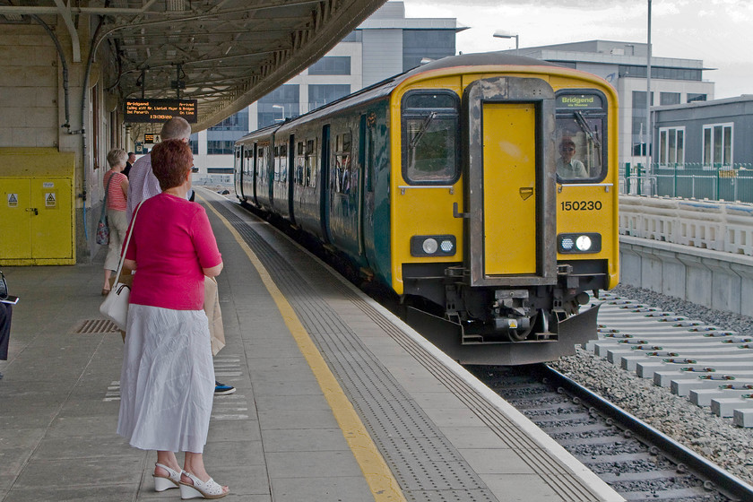 150230, AW 13.00 Bargoed-Bridgend (2P55), Cardiff Central station 
 150230 arrives at Cardiff station's platform seven with the 13.00 Bargoed to Bridgend service. We took this 2P55 working to the next station at Grangetown. From there we were able to walk to our final destination only then to be forced to take a taxi back across the city to collect our car! 
 Keywords: 150230 13.00 Bargoed-Penarth 2P55 Cardiff Central station Arriva Trains Wales Sprinter