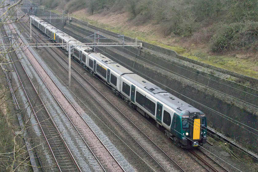 350240 & 350264, LN 10.05 Liverpool Lime Street-London Euston (2Y08, RT), Roade cutting 
 So we come to my final picture of 2019! Packed with revellers heading to London for the New Year celebrations, 350240 and 350264 pass south through Roade cutting working the 10.05 Liverpool to Euston. 2019 has been a very busy year on the railway front with huge changes taking place. 2020 will see the consolidation of these changes and I will be there with camera in hand to record these changes.

A happy New Year to my readers! 
 Keywords: 350240 350264 10.05 Liverpool Lime Street-London Euston 2Y08 Roade cutting Desiro London NorthWestern