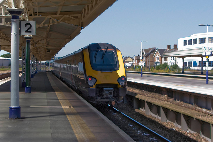 221129, XC 06.45 Newcastle-Plymouth (1V48), Taunton station 
 Having arrived at Taunton, the weather had been transformed from a dull and grey day to one more like mid-summer! A bit of a grab shot of 221119 as it leaves the Somerset county town with the 06.45 Newcastle to Plymouth. I had travelled on this 1V48 service from Birmingham New Street along with my bike stowed in one of the three allotted bike racks. 
 Keywords: 221129 06.45 Newcastle-Plymouth 1V48 Taunton station Cross Country Trains Voyager