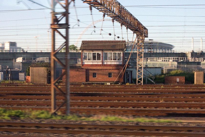 Willesden Carriage Shed North Signal Box 
 A remarkable survivor at the northern end of Wembley Yard is the 1953 built Willesden Carriage Shed North signal box. It controls the northern entry and exit to the extensive yard. Surely, it cannot be long until automation renders this relic of another age redundant? 
 Keywords: Willesden Carriage Shed North Signal Box LMS