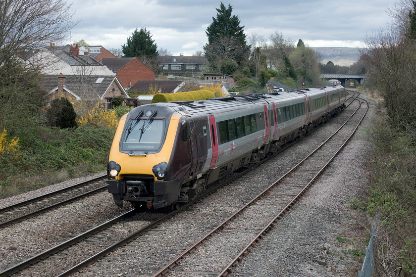 221135, XC 08.20 Aberdeen-Plymouth (1V60, 1L), Cloddy bridge 
 Voyager 221135 passes Cloddy bridge in the suburbs of Cheltenham working the 08.20 Aberdeen to Plymouth service. What a way to make a journey it must be from the northeast of Scotland to the southwest in what is, after all, a five-car DMU with its cramped and plastic (Formica type) interior! 
 Keywords: 221135 08.20 Aberdeen-Plymouth 1V60 Cloddy bridge CrossCountry Voyager