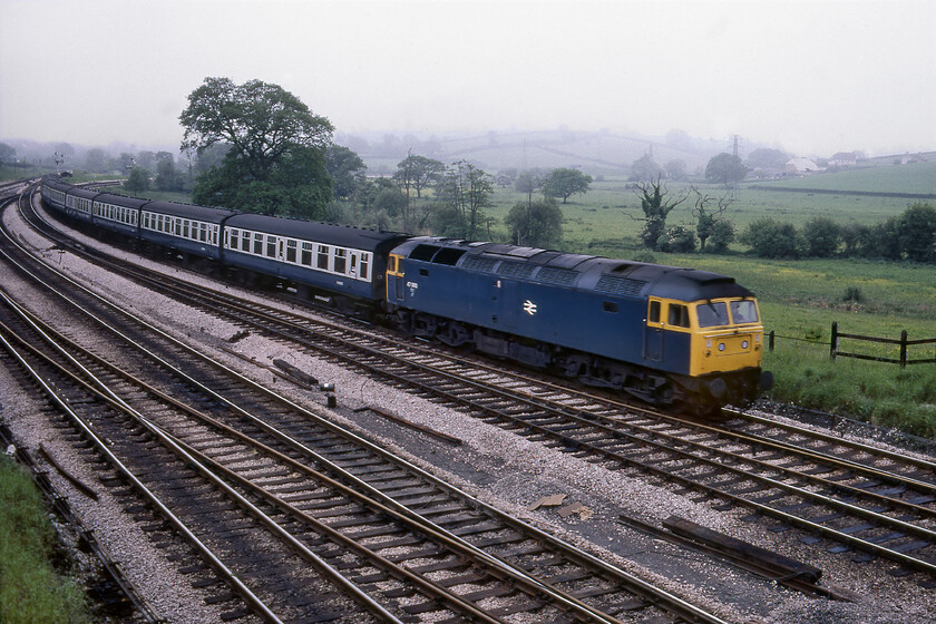 47060, 12.35 Penzance-Cardiff Central (1C52), Aller Junction 
 47060 passes Aller Junction just west of Newton Abbot leading the 12.35 Penzance to Cardiff Central service. I saw and photographed the same Class 47 at the same location, albeit going in the opposite direction, the previous summer but since then it has been in the works for its headcode panel to be plated over, see.... https://www.ontheupfast.com/p/21936chg/29751820604/x47129-10-55-london-paddington-newquay 
 Keywords: 47060 12.35 Penzance-Cardiff Central 1C52 Aller Junction