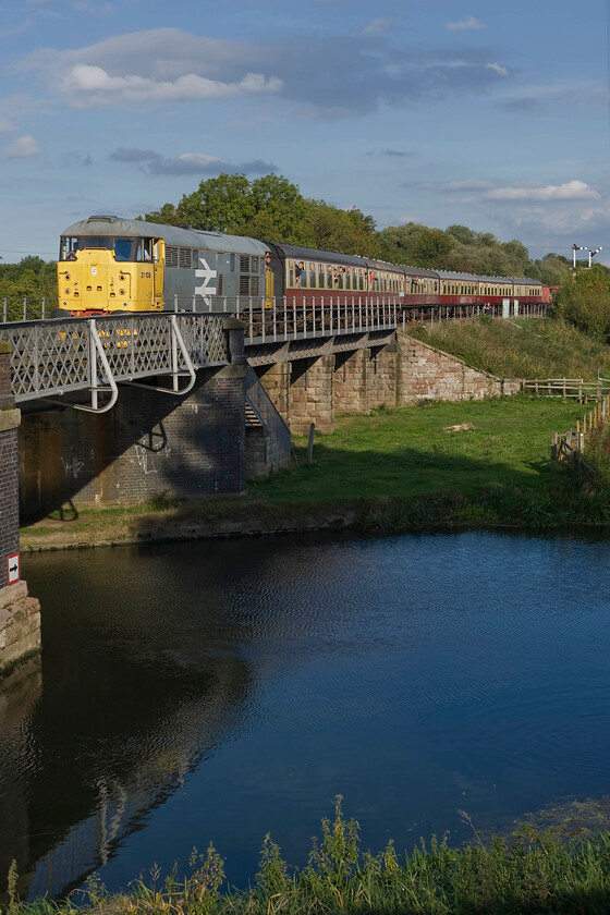 31108, 14.50 Peterborough Nene Valley-Wansford (2M51), River Nene bridge, Wansford 
 Following the clouding over during the middle of the day, the sun has come out again in the late afternoon brightening up the scene at Wansford. 31108 (in lieu of 20001) brings the 14.50 Peterborough Nene Valley to Wansford towards the station crossing the attractive bridge that spans the River Nene. 
 Keywords: 31108 14.50 Peterborough Nene Valley-Wansford 2M51 River Nene bridge Wansford