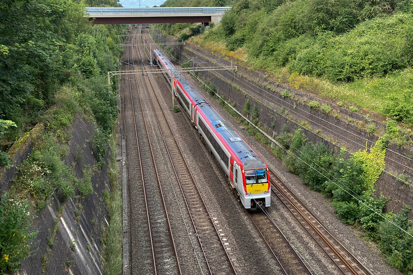 175003 & 175113, 08.35 Landore TMD-Ely Papworth Sidings (5Q46, 9E), Roade cutting 
 175003 is seen at the rear of the 5Q46 08.35 Landore (Swansea) to Ely Papworth with 165113 leading. With an almost prophetic irony, I photographed 175003 just two years previously at Chester and predicted exactly what is taking place here, see....https://www.ontheupfast.com/p/21936chg/30028598565/x175003-12-17-maesteg-holyhead-1w94 The only thing that has suprised me is that the transition I mentioned back in 2022 has taken so long but that is down to, once again, problems with the new trains, see.... https://www.ontheupfast.com/p/21936chg/30054131487/x197031-10-01-wolverton-centre-sidings 
 Keywords: 175003 175113 08.35 Landore TMD-Ely Papworth Sidings 5Q46 Roade cutting