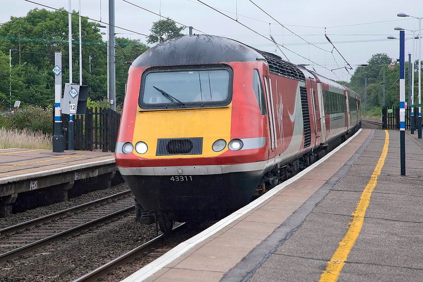 43311, GR 05.26 Stirling-London Kings Cross (1E03, 3L), St 
 43311 leads the 1E03 05.26 Stirling to London King's Cross at speed through St. Neots station. 43311 was released as 43111 (part of set 254028) in 1979. 
 Keywords: 43311 1E03 St. Neots station