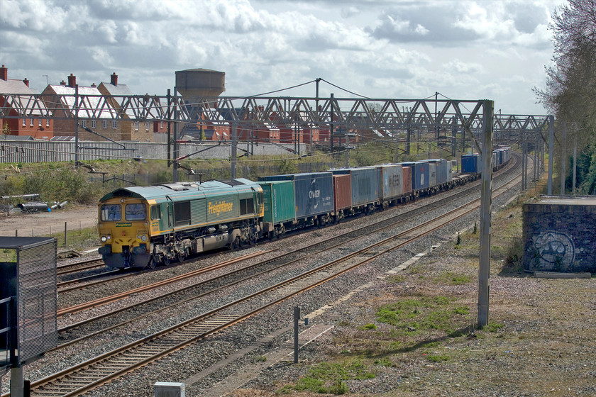 66546, 08.32 Ipswich-Lawley Street(), site of Roade station 
 66546 passes the site of Roade station with the 4M94 07:50 Felixstowe to Lawley Street Freightliner. Unfortunately, at this time of the day (mid-morning) with the sun out, there are no local locations where the sun is not head-on! With the COVID-19 travel limitations in place, I had to make the best of a bad job so opted for this location not far from home with just strong side on lighting! 
 Keywords: 66546 08.32 Ipswich-Lawley Street site of Roade station