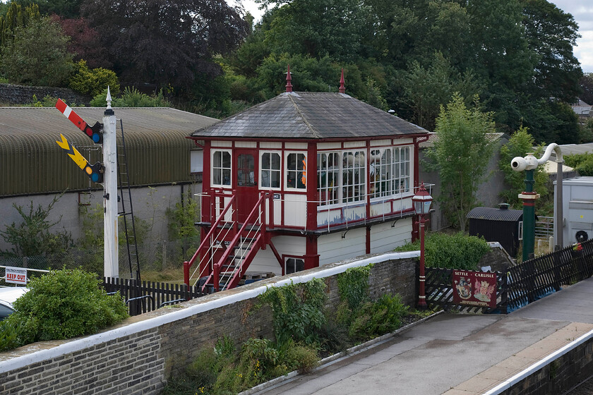 Former Settle Station signal box (Preserved, Mid, 1891) 
 Settle station signal box was closed by BR in 1984 in an effort to cut the running costs of the line or was it to further facilitate their case for closure? Either way, the signal box was not simply destroyed but was dismantled and moved to this location slightly back from the line. It is now run as a small working museum dedicated to mechanical-era railway signalling on the Settle-Carlisle Railway being staffed and maintained by a small group of dedicated volunteers and is open to the public on a regular basis. According to the Historic England website, the Midland Type 2a box is Grade II listed box that dates from 1891 cost 235 to construct including its associated signalling, that equates to 27,000 today! 
 Keywords: Former Settle Station signal box Preserved, Midland Railway 1891)