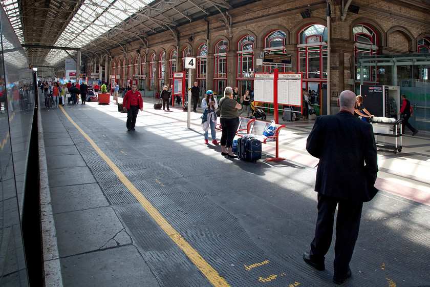 390119, VT 10.51 Edinburgh Waverley-London Euston (9M54), Preston station 
 Taken from the open door of our Pendolino, 390119 'Virgin Warrior.' as it pauses at Preston station. I like Preston station, it's a busy and purposeful place that has a lot of trains coming and going. The station will evolve further soon with the extension of the electrification masts to Blackpool bringing new services and new stock. 
 Keywords: 390119 10.51 Edinburgh Waverley-London Euston 9M54 Preston station