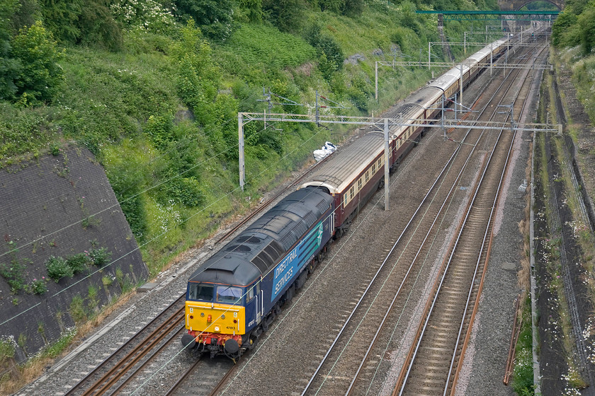 47813, outward leg of DBS excursion Liverpool Lime Street-Bletchley (& on to London Euston) (1Z58), Roade cutting 
 47813 'Solent' leads the outward leg of a DBS staff excursion from Liverpool to, of all paces, Bletchley! Staff were then able to head on to London if they desired, I suspect that most would have done! The DRS compass liveried Class 47 is leading a smart set of Belmond's faux Pullman stock converted from various stock including examples of Mks. I, II and III. 
 Keywords: 47813 DBS excursion, Liverpool Lime Street-Bletchley1Z58 Roade cutting Solent