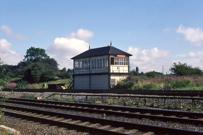 Sharnbrook signal box (Mid, date not known) 
 I last visited Sharnbrook just over a year ago and took a photograph of Sharnbrook's Midland signal box then but in cloudy conditions and from a different angle to this one, see..... https://www.ontheupfast.com/p/21936chg/26818863804/sharnbrook-signal-box I must have figured that a bit of summer sunshine warranted another Kodachrome slide being used for a second photgraph! Unfortunately, I still do not know its date of construction but I do know that it closed just under a year from the day of this visit. 
 Keywords: Sharnbrook signal box