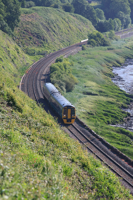 158831, AW 07.45 Cheltenham Spa-Maesteg (2L47, RT), Purton SO672049 
 158831 makes its way along the Severn Estuary approaching the tiny village of Purton with the 07.45 Cheltenham Spa to Maesteg working. The mud flats of the River Severn can just be seen on the far right of the image. Also, the evidence of the extensive tree clearance can be clearly seen on the steep face of the bank in the background. 
 Keywords: 158831 2L47 Purton SO672049