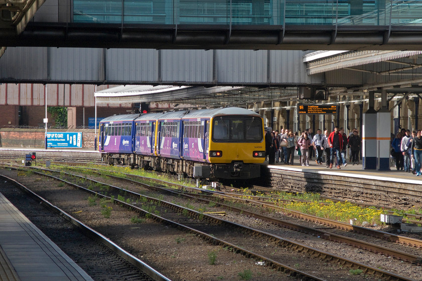 144006, NT 07.48 Leeds-Sheffield (2N15), Sheffield station 
 144006 and a classmate disgorge their passengers at Sheffield station. The twin-set service has just terminated having worked the 2N15 07.48 from Leeds. In the coming few years, these much un-loved units are to be withdrawn from service with brand new shiny trains on-order for the north. 
 Keywords: 144006 07.48 Leeds-Sheffield 2N15 Sheffield station Pacer Northern Rail