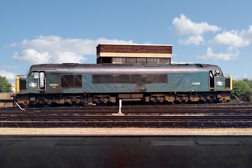 45003, going on-shed, Bristol Temple Meads station 
 Another broadside of a Peak at Bristol. 45003 is seen waiting to go on-shed after being removed from a train in the station. Behind this 135 ton engine is Temple Meads Loco Yard Signal Box. As its name suggests, it controlled entry and exit into Bath Road Depot and was kept pretty busy due to the high number of locomotive movements throughout the day. Just as an aside, I always thought the the Peaks were so named because of their appearance. In my head I convinced myself that they they had got peaked ends; makes sense doesn't it? Only some years later did I realise that it was because of the pioneer class 44s being named after UK mountains!