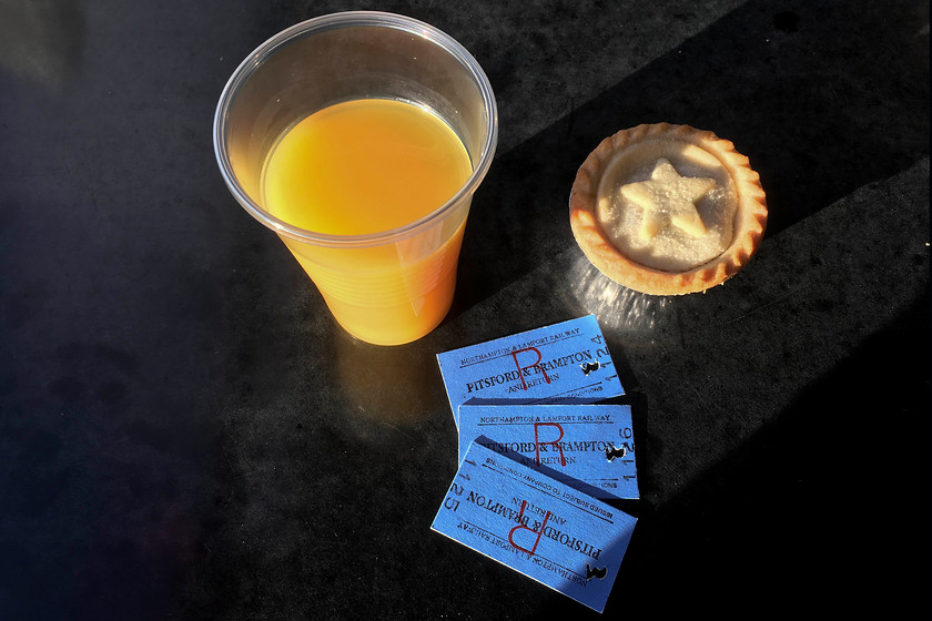 Orange juice, mince pie and tickets 
 Our tickets to ride! As it was New Year's day, mince pies, orange juice or sherry, for those who so desired, was served by the the on-board staff.