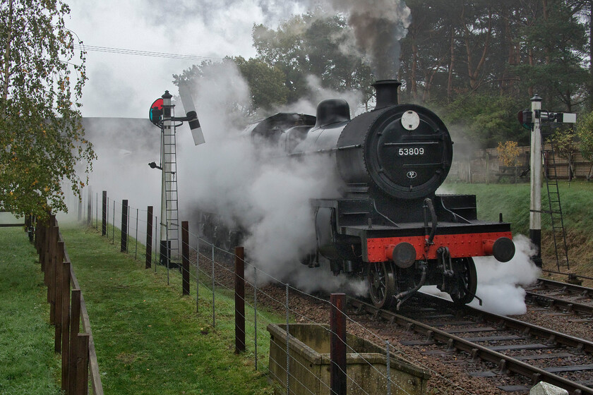 53809, 10.00 Sheringham-Holt, Weybourne station 
 On the 21st October, 2022 former Somerset and Dorset 7F 53809 leaves Weybourne station leading the 10.00 Sheringham to Holt service, the first passenger service of the day on the North Norfolk Railway. Despite all the steam and exhaust, the locomotive was being steamed very carefully by the driver in no small part due to the wet and leaf-strewn railhead that could cause a lot of wheel slip. 
 Keywords: 53809 10.00 Sheringham-Holt Weybourne station S&DR 7F Somerset and Dorset