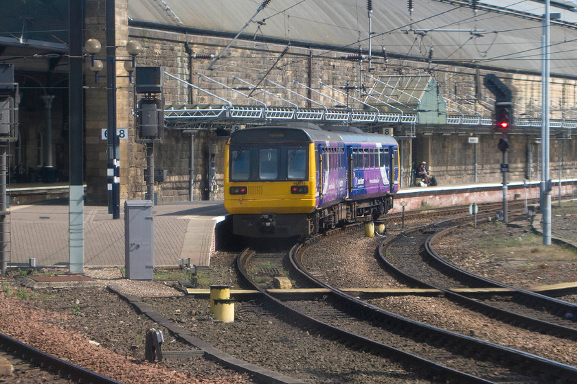 142118, NT 11.40 Metrocentre-Newcastle (2W31), Newcastle station 
 On arrival at Newcastle station, the first train that greated us was a delightful Northern Trains Pacer. 142118 is pulling into platform eight with the 11.40 Metrocentre to Newcastle shuttle, a distance of just over three miles. 
 Keywords: 142118 11.40 Metrocentre-Newcastle 2W31 Newcastle station pacer Northern Trains