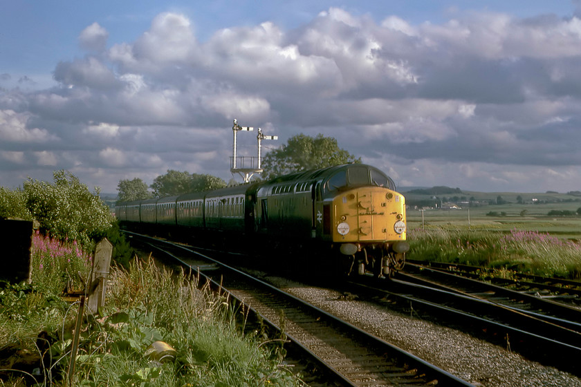 Class 40, 16.05 Nottingham-Carlisle, Settle Junction 
 Whilst we were at Settle Junction, the bells rang out in the box and the down signals were pulled off. After a short wait, the unmistakable sound of a class 40 was heard leading the 16.05 Nottingham to Carlisle service just beginning its assault of the Settle and Carlisle line. It is unfortunate that I do not have the identity of the class 40 and that it is taken the wrong side of the sun; if anybody can help with the former of these, I would appreciate it. 
 Keywords: Class 40 16.05 Nottingham-Carlisle Settle Junction