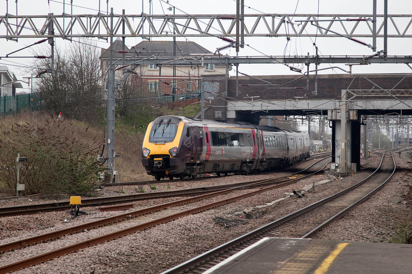 221126, XC diverted 10.14 Birmingham New Street-Edinburgh (1S41, RT), Nuneaton station 
 Due to engineering works on the Trent Valley line near to Burton-on-Trent services were being diverted south to Nuneaton, across to Leicester and then up the MML to Derby. Consequently, there was the unusual spectacle of Cross Country trains passing through Nuneaton. Here, 221126 has just passed through the station working the 10.14 from Birmingham New Street to Edinburgh. Despite the diversion, it still managed to arrive on-time in the Scottish capital. 
 Keywords: 221126 diverted 10.14 Birmingham New Street-Edinburgh 1S41 Nuneaton station