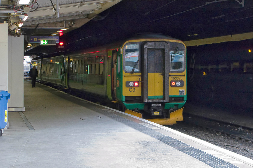 153375, LM 10.42 Birmingham New Street-Walsall (2A89), Birmingham New Street station 
 153375 waits inside Birmingham New Street to work the 10.42 to Walsall. This service ought to be operated by a Class 323 electric unit but in this case a diesel has been forced to substitute that seems rather wasteful. 
 Keywords: 153375 10.42 Birmingham New Street-Walsall 2A89 Birmingham New Street station