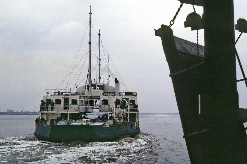 MV Farringford, 15.15 New Holland Pier-Hull Corporation Pier, New Holland Pier 
 With its car deck pretty well loaded the 15.15 New Holland to Hull Corporation Pier ferry service powers away from New Holland with its twin six-cylinder English Electric engines providing plenty of amps to power the propellor motors. The strange-shaped flat panel at the stern (in this case as it's sailing away from me) of MV Farringford is where the original loading door was placed as when launched up until conversion in 1977. After this date it was converted to side loading for use on this, the Humber crossing. 
 Keywords: MV Farringford 15.15 New Holland Pier-Hull Corporation Pier New Holland Pier