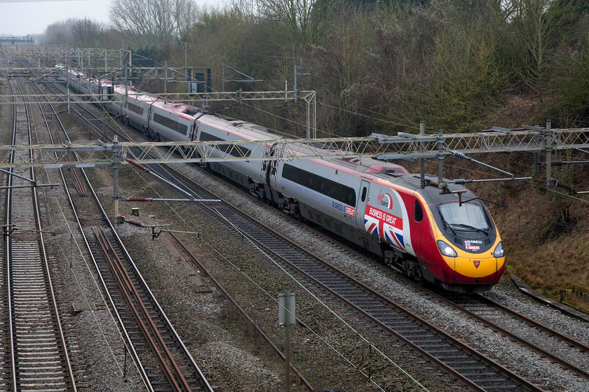 390151, VT 13.30 London Euston-Glasgow Central (1S69), Victoria bridge 
 This Pendolino is instantly recognisable as being 390151 'Virgin Ambassador' due it its unique and striking 'Business is Great' vinyls. It is seen passing Victoria bridge with the 13.30 Euston to Glasgow Central. 
 Keywords: 390151 13.30 London Euston-Glasgow Central 1S69 Victoria bridge