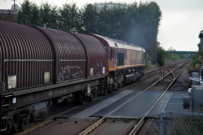 66170, 16.25 Hedon Road Sidings-Masborough, Goole station 
 As per the nuclear flask train the previous day at Cark station, we arrived at Goole as the train was approaching at speed! Lukily the camera settings were correct grab a going-away shot of 66170 leading the 16.25 Hedon Road to Masborough steel train. It is seen crossing the level crossing immediately west of Goole station. 
 Keywords: 66170 16.25 Hedon Road Sidings-Masborough Goole station