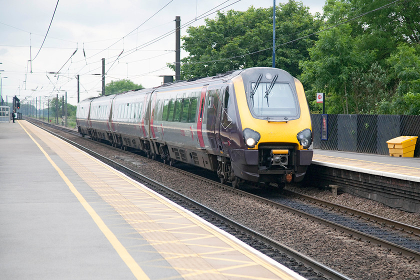 220033, XC 09.45 Reading-Newcastle (1E32), Northalleton station 
 In very flat lighting, 220033 speeds through Northallerton station forming the 1E32 09.45 Reading to Newcastle service. Northallerton station has a complicated layout of tracks with a pair of avoiding lines away behind the trees in the background. It is also the point where the Redmire branch diverges from the ECML, this line is the home of The Wensleydale heritage line. 
 Keywords: 220033 09.45 Reading-Newcastle 1E32 Northalleton station