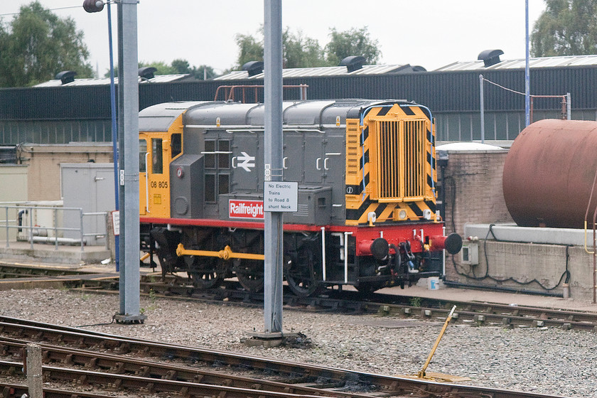 08805, stabled, Soho depot 
 Looking very smart in its Railfreight livery, 08805 is seen stabled at Soho depot. Built at Derby works in 1960 and released into service as D3973 it started its working career at Gloucester then moving to the Birmingham area where it has remained since. It is used to shunt units and occasionally coaching stock at the Soho depot. 
 Keywords: 08805 Soho depot